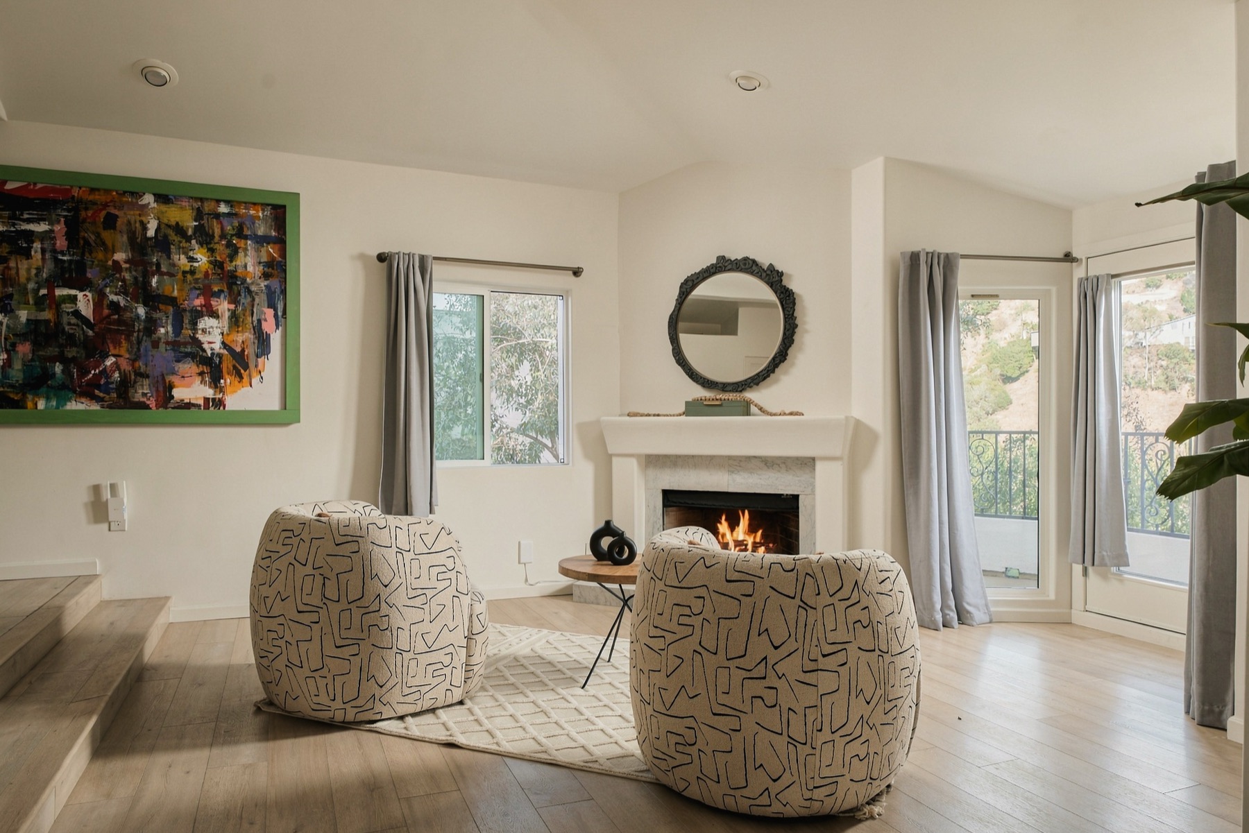 Primary suite fireplace and balcony door