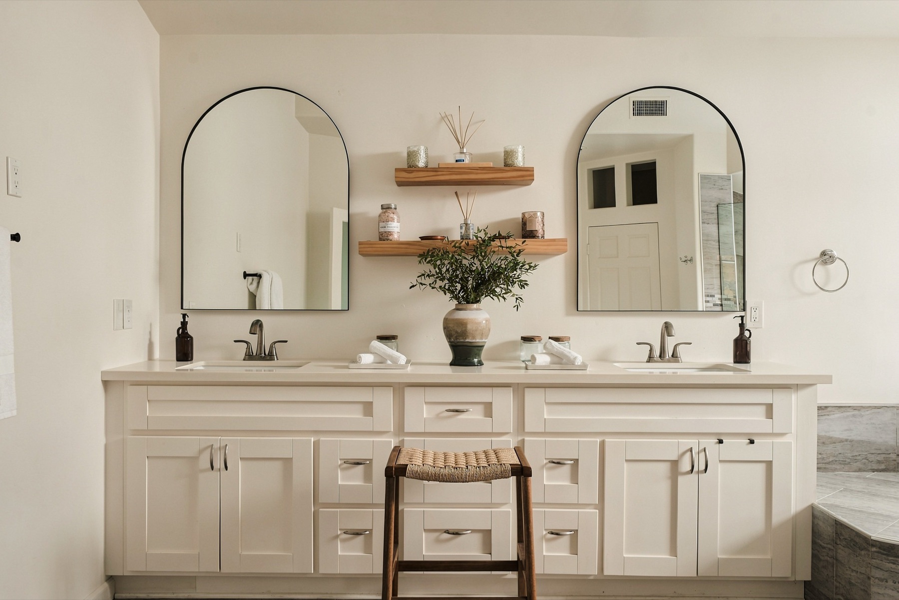 Primary bath dual vanity with arched mirrors
